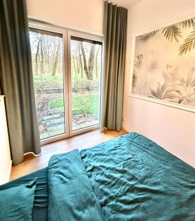 Stylowy apartament z prywatnym ogrodem, widokiem na park i parkingiem - Red Park Poznań - Poznań - 4