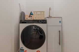 Central 1BR Apartment with Kitchen & Patio - 4