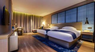 Echarm Hotel Guizhou Xingyi Jushan Avenue - Xiawutun - 9