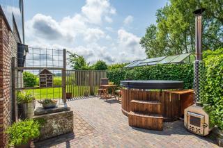 Gastsuite het Duinroosje met hottub op het privé terras! - Den Burg - 8