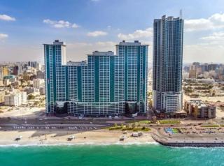 Luxury Ajman Sunrise 2BD Stay with sea view & Pool - Ajman - 1
