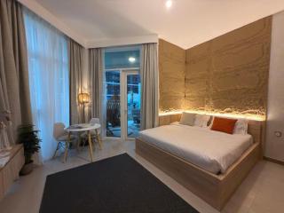 Cozy Studio with Balcony Pool View - Business Bay - 0