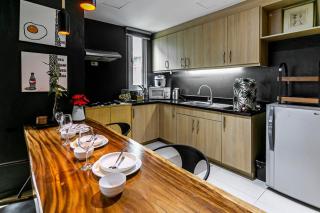 BGC Sleek Black Wood Corner Studio - Manila - 6