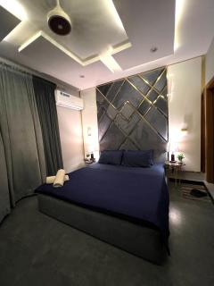 Chic Chamber 2BHK Bahria Living Self Check-in - 1