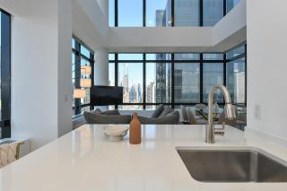 Opulent 2BR Duplex - Iconic Midtown Views - 6