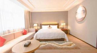 Echeng Hotel Laibing Jinxiu Shuidian Tower - 1