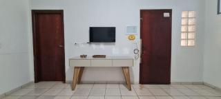 Casa a 1min do Espaço Cultural, com garagem coberta - Monte Carmelo - 1