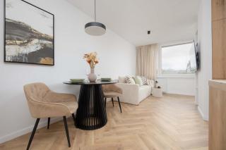 Cosy Apartment with Balcony near PGE by Noclegi Renters - Warsaw - 0