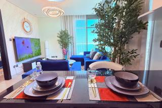 Blue Seaview 75 inch Smart TV 1Br - Manama - 8