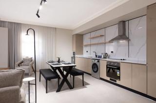 Luxury 1BR 2 Twins Pool BH-26-005 - New cairo - 2