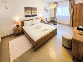 Divine 1BR Escape Pool Gym Parking Al Reef - Abu Dhabi - 7