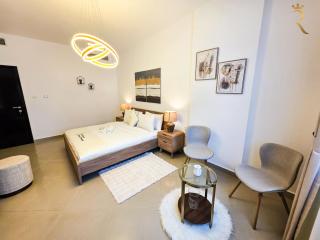 Divine 1BR Escape Pool Gym Parking Al Reef - Abu Dhabi - 3