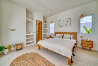 Charming 2BR Villa with Elegant Wooden Furnishings - 9