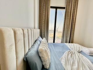 Homes2Retreat - Modern Comforts 1 BR in Liva Lush Living - Dubái - 1