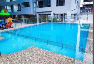 celestial modernly furnished two bedroom apartment with amazing city views swimming pool ,children playground ,ample private parking space and rooftop chill spot - Nairobi - 6