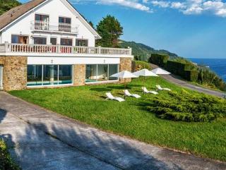 moderna casa de lujo con piscina cubierta y vista al mar - San Sebastian - 0