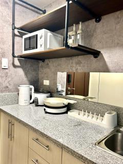 Cozy Studio near Nuvali, Enchanted Kingdom - Private Cinema with Netflix & Disney Plus with Free Pool Access - Silang - 4