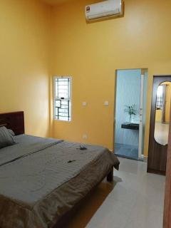 A two-bedroom home with natural light and green environment - 9