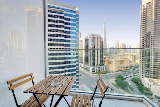 Vacationer Holiday Homes l Bright Studio l Burj Khalifa View l Business Bay - 1