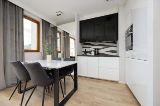 Comfortable Studio in Warsaw with Parking by Noclegi Renters - Warsaw - 1