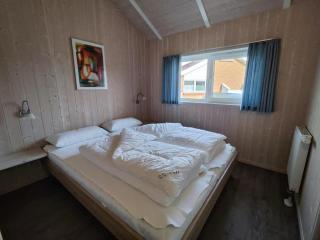 6 Personen Ferienhaus in 1. Reihe zum See mit Kanu und herrlichem Seeblick, Sauna, Whirlpool, Kaminofen, Klimaanlage und E-Tankstelle am Haus in Otterndorf - Otterndorf - 8