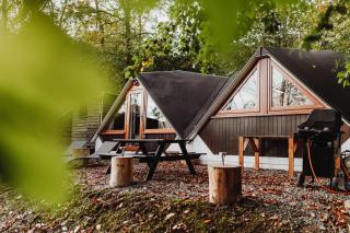 Chambre avec jacuzzi ou Chalets dans les bois - 0
