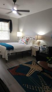 Queen Bed with Sitting Area at IMG - Bradenton - 0