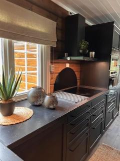 Sjarmerende tømmerhytte på Bjorli - 5