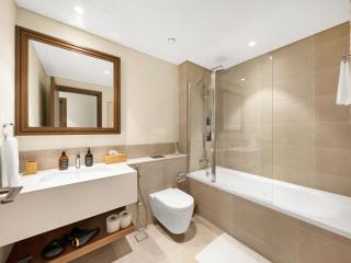 Chic 1 Bedroom with Palm Views in Palace Beach Residence - 1