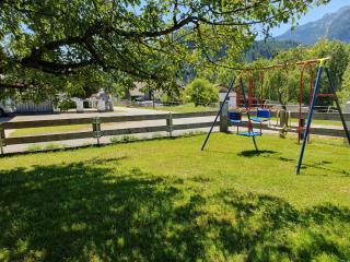 LECHUFER, 80m2, Haushälfte mit privatem Eingang, Kaminofen, Terrasse, Garten - Pinswang - 8
