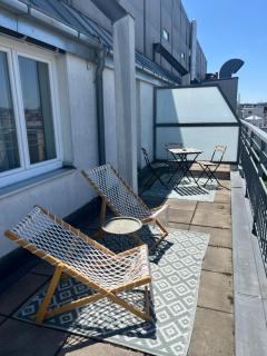 Rooftop City View Haven Apartment - 8