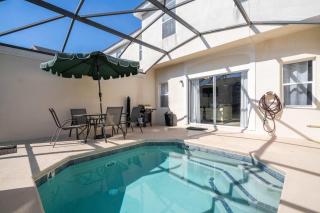 Dreamy 4BR Townhome - Pool, BBQ - Near Disney! - 0