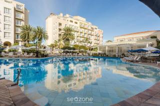 Suíte com vista para praia dentro de hotel - Seazone ILCTOP - 0