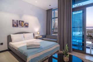 Tick- Lavish Studio with Canal & Burj Khalifa View - Sabkhah - 0