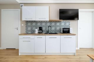 Nadmorski Apartament w Pobierowie z Parkingiem oraz Basenem by Noclegi Renters - 7