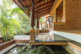 Kerala Style Villa by JadeCapsAC4BHKFishpond - Yelahanka - 1