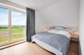 GUT KLETKAMP "Mühlenhof 5" - Ruhige Ferienwohnung mit 3 Schlafzimmern I Terrasse mit See- & Naturblick I Gemeinschaftsgarten I 15 Min zur Ostsee I Küche I Parkplatz I Waschmaschine I WLAN - 4