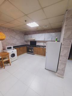 Furnished bedroom Nd Hall - Ajman - 9