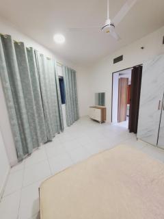 Furnished bedroom Nd Hall - Ajman - 8
