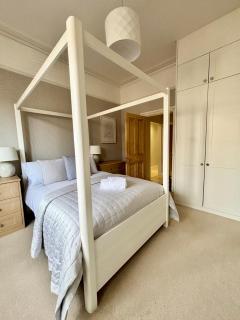 Master Bedroom with freestanding Bath and TV - Moffat - 2