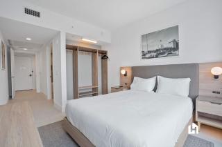 Stylish Sky-High Condo with Pool and Gym - 2