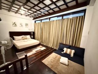 Chic Quad Room with WiFi - Near the beach and Main street - Ground Floor - General Luna - 8