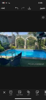 Trio Villa with coverable private pool in compound near Mall of Egypt - Sheikh Zayed - 9