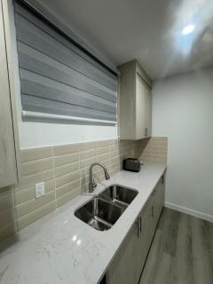 Cozy Inn new basemt wt sep entrance contains 1 bdrm and den for up to 4 guests - Airdrie - 9