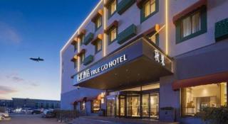 Qiuguo Hotel Beijing BIEC & Airport - Peking - 1