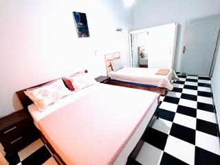 Spacious Apartment with Motorcycle Garage, Free Parking, and Air Conditioning - 7