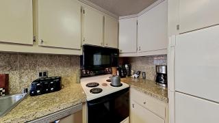 Comfy 2-Bedroom Home with Pool - 1