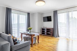 Komfort i spokój blisko natury - Apartamenty i pokoje ARKO - Ostrowo - 0