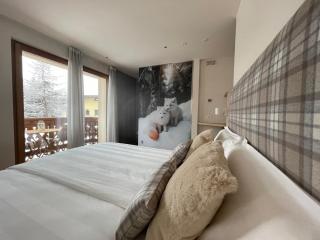 Alpine Rooms and Suites Livigno - Camana Noa - - Livigno - 9