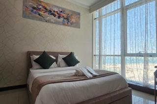 Seaview 10th floor 75 inch Smart TV - Manama - 8